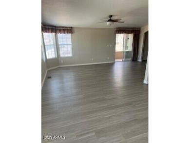 You owe it to yourself to come take a look at this newer 1400 on Apache Wells Country Club in Arizona - for sale on GolfHomes.com, golf home, golf lot