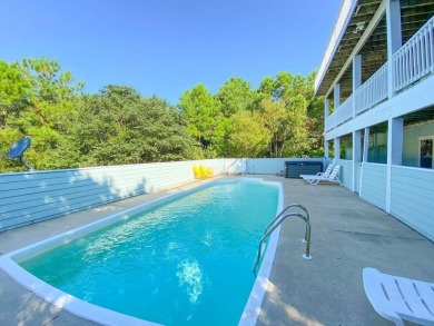 Escape and immerse yourself in the serenity of 'Sea The Green' on The Currituck Golf Club in North Carolina - for sale on GolfHomes.com, golf home, golf lot