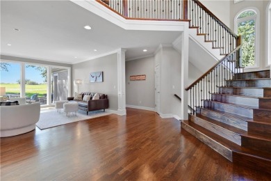 Welcome to this exquisite 1.5-story residence in the prestigious on Loch Lloyd Country Club in Missouri - for sale on GolfHomes.com, golf home, golf lot