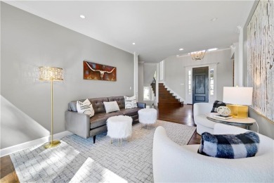 Welcome to this exquisite 1.5-story residence in the prestigious on Loch Lloyd Country Club in Missouri - for sale on GolfHomes.com, golf home, golf lot