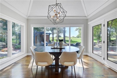 Welcome to this exquisite 1.5-story residence in the prestigious on Loch Lloyd Country Club in Missouri - for sale on GolfHomes.com, golf home, golf lot