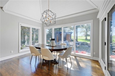 Welcome to this exquisite 1.5-story residence in the prestigious on Loch Lloyd Country Club in Missouri - for sale on GolfHomes.com, golf home, golf lot
