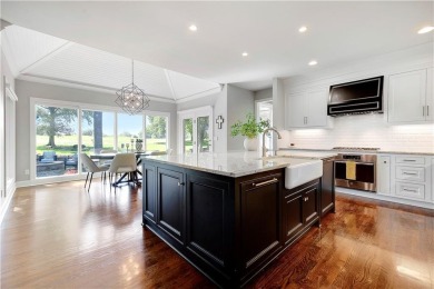 Welcome to this exquisite 1.5-story residence in the prestigious on Loch Lloyd Country Club in Missouri - for sale on GolfHomes.com, golf home, golf lot