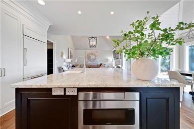 Welcome to this exquisite 1.5-story residence in the prestigious on Loch Lloyd Country Club in Missouri - for sale on GolfHomes.com, golf home, golf lot