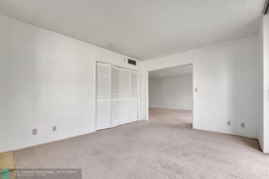 Priced to sell! Large corner unit. Freshly painted interior on Palm-Aire Country Club and Resort - Palms in Florida - for sale on GolfHomes.com, golf home, golf lot