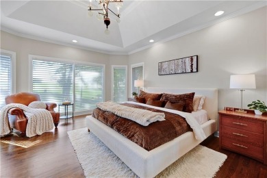 Welcome to this exquisite 1.5-story residence in the prestigious on Loch Lloyd Country Club in Missouri - for sale on GolfHomes.com, golf home, golf lot