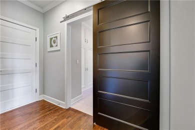 Welcome to this exquisite 1.5-story residence in the prestigious on Loch Lloyd Country Club in Missouri - for sale on GolfHomes.com, golf home, golf lot