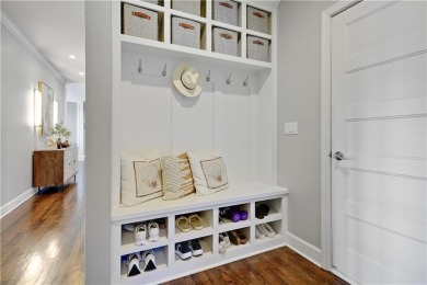 Welcome to this exquisite 1.5-story residence in the prestigious on Loch Lloyd Country Club in Missouri - for sale on GolfHomes.com, golf home, golf lot