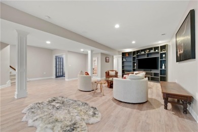 Welcome to this exquisite 1.5-story residence in the prestigious on Loch Lloyd Country Club in Missouri - for sale on GolfHomes.com, golf home, golf lot