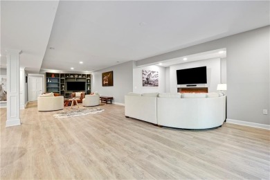 Welcome to this exquisite 1.5-story residence in the prestigious on Loch Lloyd Country Club in Missouri - for sale on GolfHomes.com, golf home, golf lot