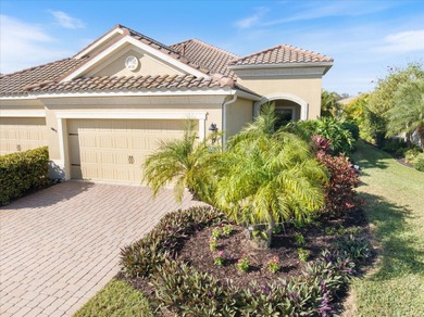 Comfort meets charm in this stunning 2-bedroom, 2-bath paired on Boca Royale Golf and Country Club in Florida - for sale on GolfHomes.com, golf home, golf lot
