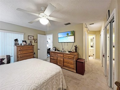 Welcome to easy Florida living in the sought-after golf on Heather Golf and Country Club in Florida - for sale on GolfHomes.com, golf home, golf lot