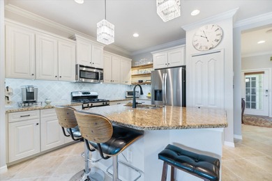 Comfort meets charm in this stunning 2-bedroom, 2-bath paired on Boca Royale Golf and Country Club in Florida - for sale on GolfHomes.com, golf home, golf lot