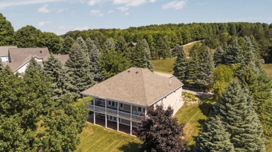 Welcome to your dream retreat at 5668 Golf Meadows Drive in on Shanty Creek Golf Course in Michigan - for sale on GolfHomes.com, golf home, golf lot
