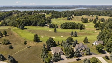 Welcome to your dream retreat at 5668 Golf Meadows Drive in on Shanty Creek Golf Course in Michigan - for sale on GolfHomes.com, golf home, golf lot