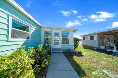 Wake up every day to peaceful water views and easy Florida on Plantation Golf Club in Florida - for sale on GolfHomes.com, golf home, golf lot