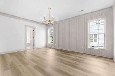 Welcome home to this beautifully refreshed residence in the on Legend Oaks Plantation Golf Club in South Carolina - for sale on GolfHomes.com, golf home, golf lot