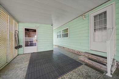 Wake up every day to peaceful water views and easy Florida on Plantation Golf Club in Florida - for sale on GolfHomes.com, golf home, golf lot