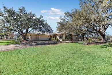 Offered for sale for the first time, this custom single story on Palmer Lakeside At Barton Creek in Texas - for sale on GolfHomes.com, golf home, golf lot