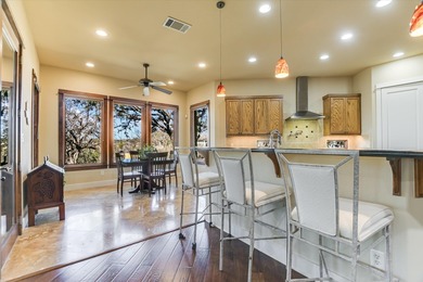 Offered for sale for the first time, this custom single story on Palmer Lakeside At Barton Creek in Texas - for sale on GolfHomes.com, golf home, golf lot