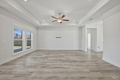 Built in 2021 and thoughtfully elevated beyond standard builds on Champion Golf Club in Florida - for sale on GolfHomes.com, golf home, golf lot