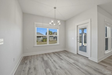 Built in 2021 and thoughtfully elevated beyond standard builds on Champion Golf Club in Florida - for sale on GolfHomes.com, golf home, golf lot