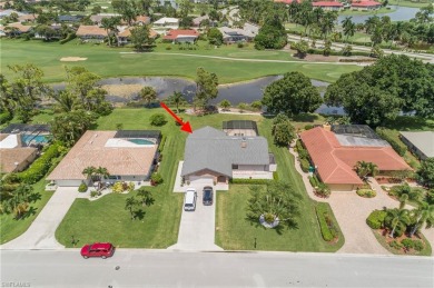 Tropical, lushly landscaped .27 acre lot with tranquil lagoon on Royal Palm Golf Club in Florida - for sale on GolfHomes.com, golf home, golf lot