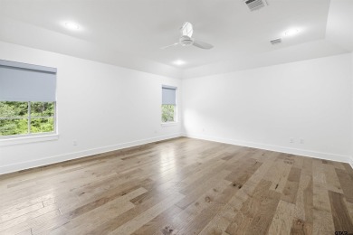 Discover refined living in this stunning 4-bedroom, 4.5-bath on Cascades Golf Club in Texas - for sale on GolfHomes.com, golf home, golf lot