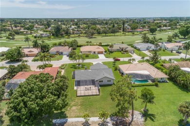 Tropical, lushly landscaped .27 acre lot with tranquil lagoon on Royal Palm Golf Club in Florida - for sale on GolfHomes.com, golf home, golf lot