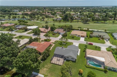 Tropical, lushly landscaped .27 acre lot with tranquil lagoon on Royal Palm Golf Club in Florida - for sale on GolfHomes.com, golf home, golf lot