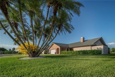 Tropical, lushly landscaped .27 acre lot with tranquil lagoon on Royal Palm Golf Club in Florida - for sale on GolfHomes.com, golf home, golf lot