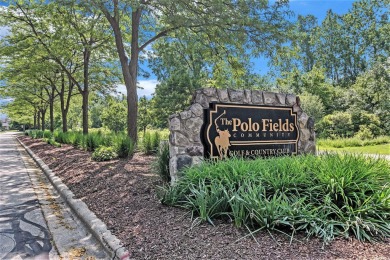 Set on one of the most scenic lots in the Polo Fields, this on Polo Fields Golf and Country Club in Michigan - for sale on GolfHomes.com, golf home, golf lot