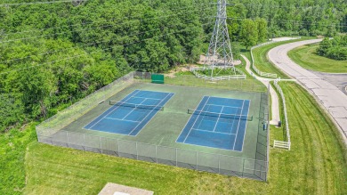 Set on one of the most scenic lots in the Polo Fields, this on Polo Fields Golf and Country Club in Michigan - for sale on GolfHomes.com, golf home, golf lot