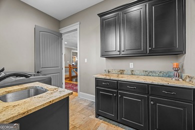 Experience refined living in this exceptional 4,630 sq ft on Currahee Golf Club in Georgia - for sale on GolfHomes.com, golf home, golf lot