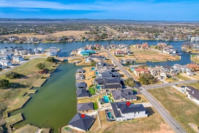 NEW TO MARKET: 2024 Modern Waterfront Masterpiece in Clearwater on Legends Golf Course in Texas - for sale on GolfHomes.com, golf home, golf lot