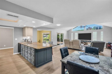 Located in the desirable Highland Lakes community, this on Highland Lakes Executive Golf Course in Florida - for sale on GolfHomes.com, golf home, golf lot