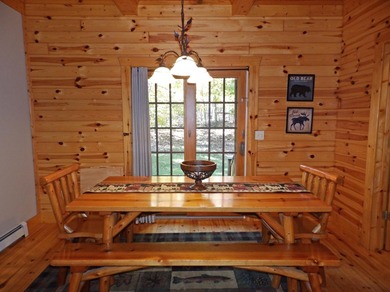 Welcome to this beautifully maintained Northern Michigan getaway on Michaywe Pines Course in Michigan - for sale on GolfHomes.com, golf home, golf lot