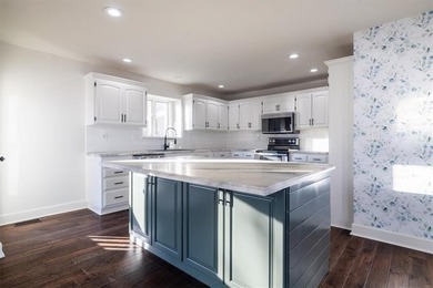 Step into his beautiful and updated 1 1/2 Story home featuring 4 on Paradise Pointe Golf Complex in Missouri - for sale on GolfHomes.com, golf home, golf lot