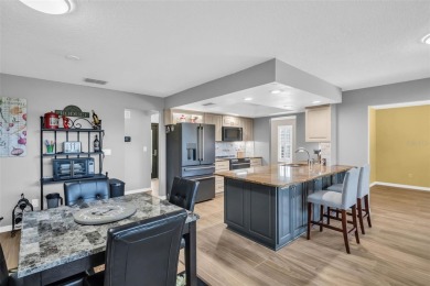 Located in the desirable Highland Lakes community, this on Highland Lakes Executive Golf Course in Florida - for sale on GolfHomes.com, golf home, golf lot
