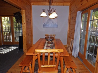 Welcome to this beautifully maintained Northern Michigan getaway on Michaywe Pines Course in Michigan - for sale on GolfHomes.com, golf home, golf lot