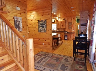 Welcome to this beautifully maintained Northern Michigan getaway on Michaywe Pines Course in Michigan - for sale on GolfHomes.com, golf home, golf lot