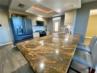 Located in the desirable Highland Lakes community, this on Highland Lakes Executive Golf Course in Florida - for sale on GolfHomes.com, golf home, golf lot