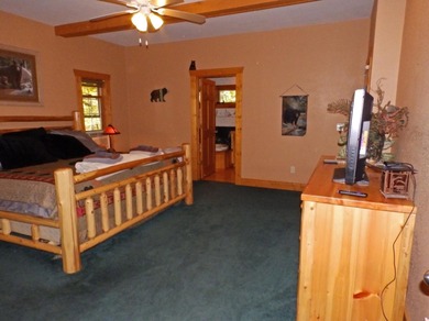 Welcome to this beautifully maintained Northern Michigan getaway on Michaywe Pines Course in Michigan - for sale on GolfHomes.com, golf home, golf lot