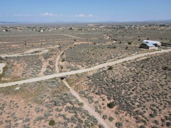 Beautiful one acre parcel of land located on the south end of on Taos Country Club in New Mexico - for sale on GolfHomes.com, golf home, golf lot