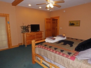 Welcome to this beautifully maintained Northern Michigan getaway on Michaywe Pines Course in Michigan - for sale on GolfHomes.com, golf home, golf lot