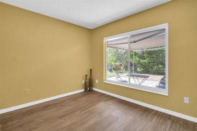 Located in the desirable Highland Lakes community, this on Highland Lakes Executive Golf Course in Florida - for sale on GolfHomes.com, golf home, golf lot