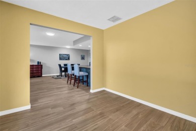 Located in the desirable Highland Lakes community, this on Highland Lakes Executive Golf Course in Florida - for sale on GolfHomes.com, golf home, golf lot
