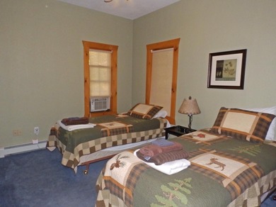 Welcome to this beautifully maintained Northern Michigan getaway on Michaywe Pines Course in Michigan - for sale on GolfHomes.com, golf home, golf lot