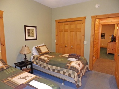 Welcome to this beautifully maintained Northern Michigan getaway on Michaywe Pines Course in Michigan - for sale on GolfHomes.com, golf home, golf lot