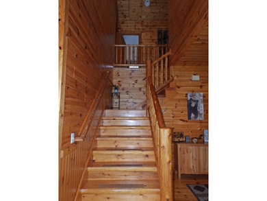 Welcome to this beautifully maintained Northern Michigan getaway on Michaywe Pines Course in Michigan - for sale on GolfHomes.com, golf home, golf lot
